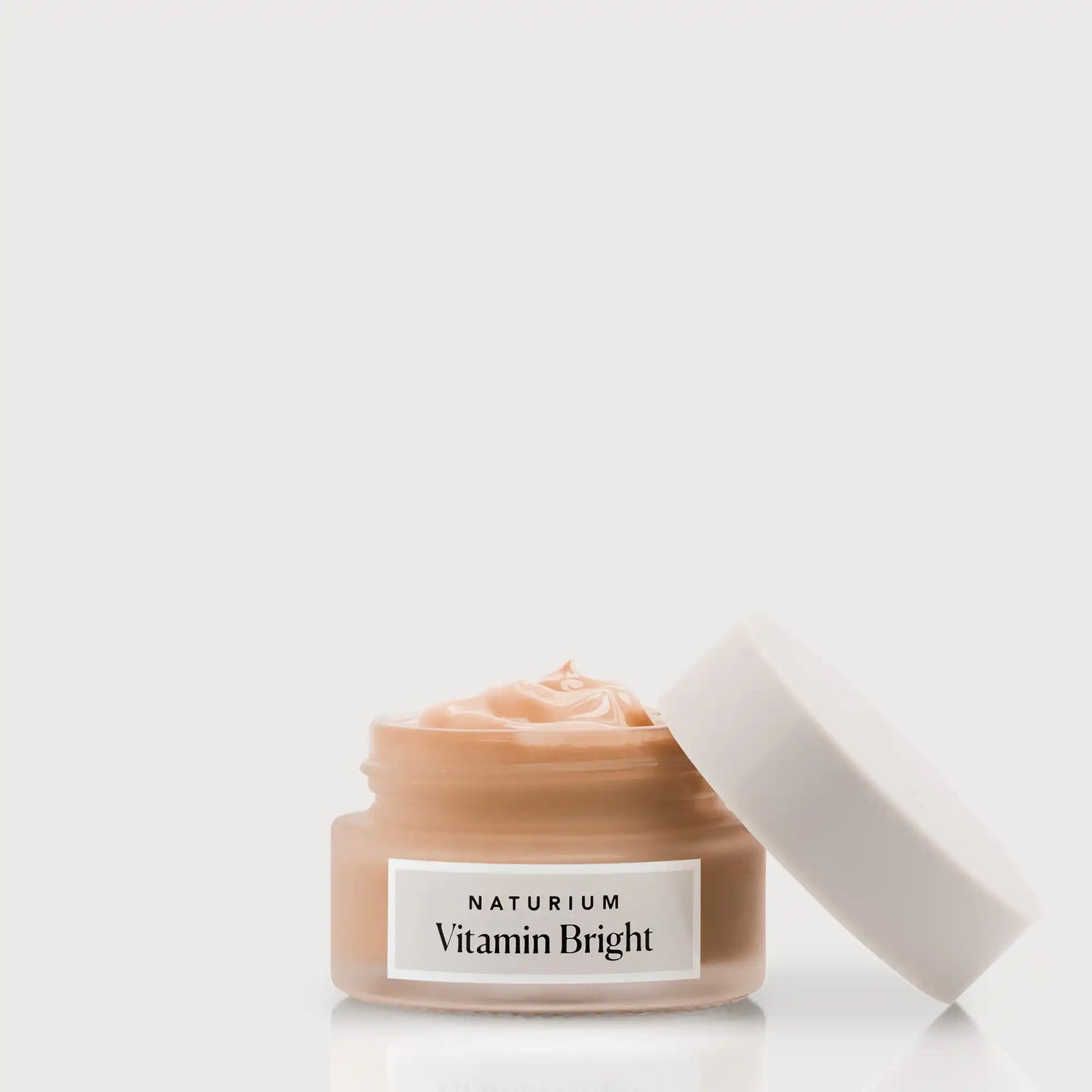 vitamin-bright-illuminating-eye-cream-d1 NATR-VitaminBright_DEEP_Primary_front_openjar_bone.webp