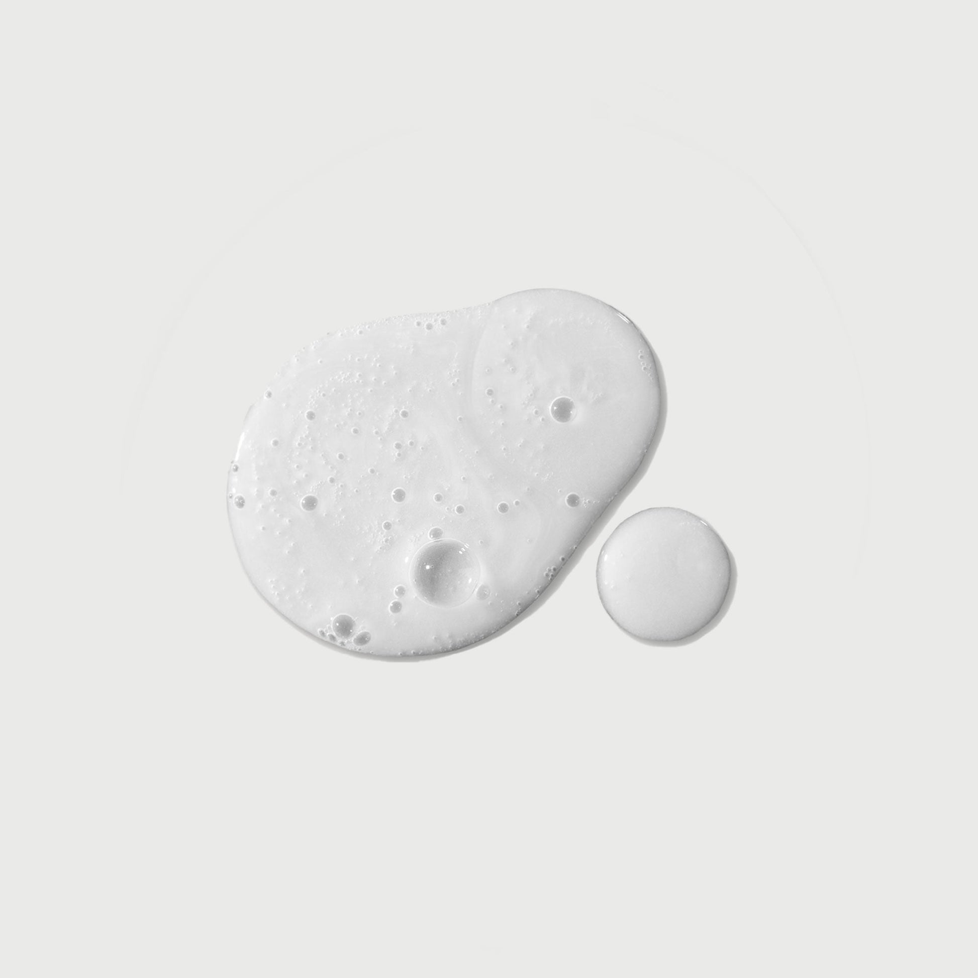 the-purifier-niacinamide-serum-body-wash-g6 NATR-40012-Swatch-The-Purifier-Niacinamide-Serum-Body-Wash-bonebkgd.jpg