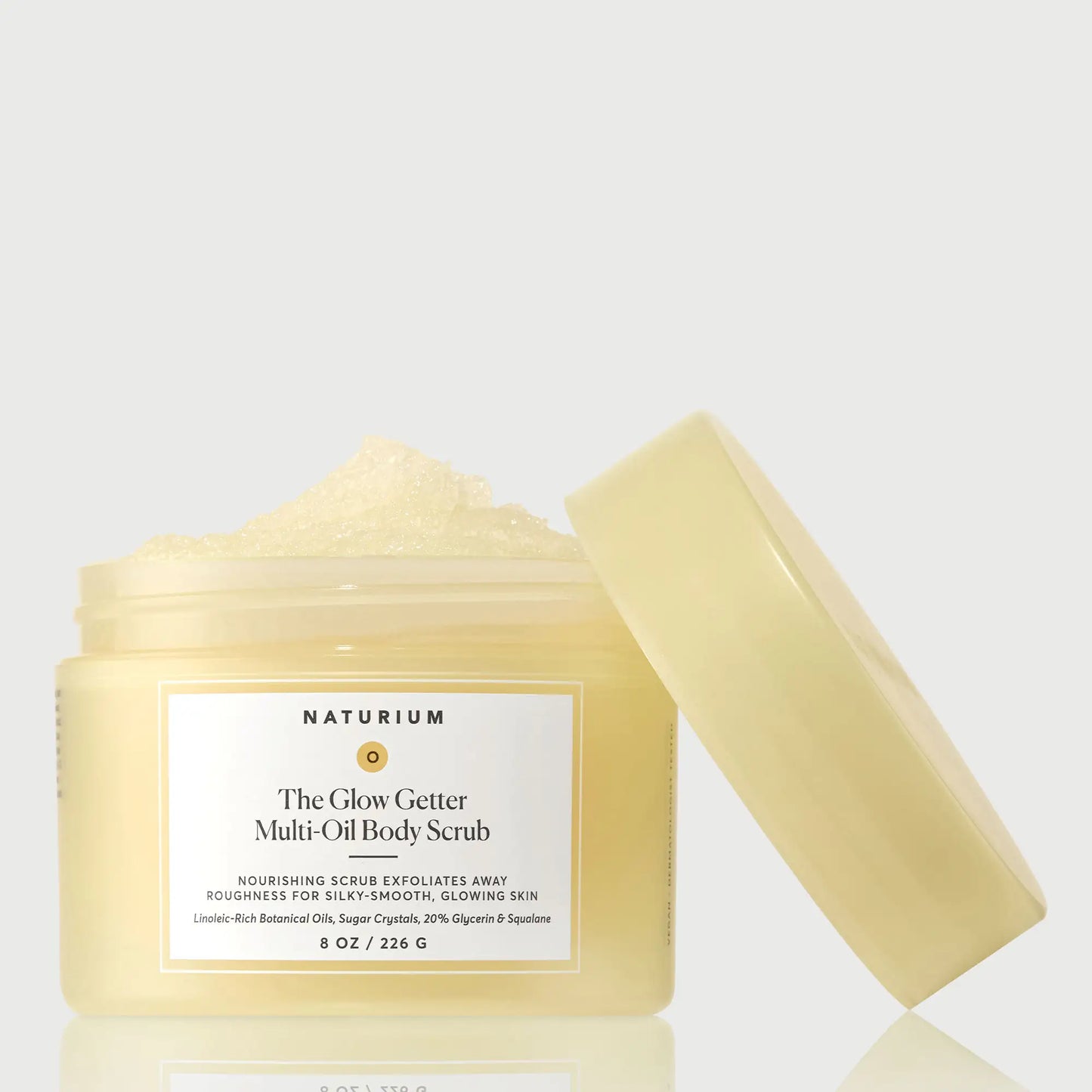 the-glow-getter-multi-oil-body-scrub-m8 NATR-40028-GlowGetter-Multi-Oil-Body-Scrub-Front-CapOff-bonebkgd.webp