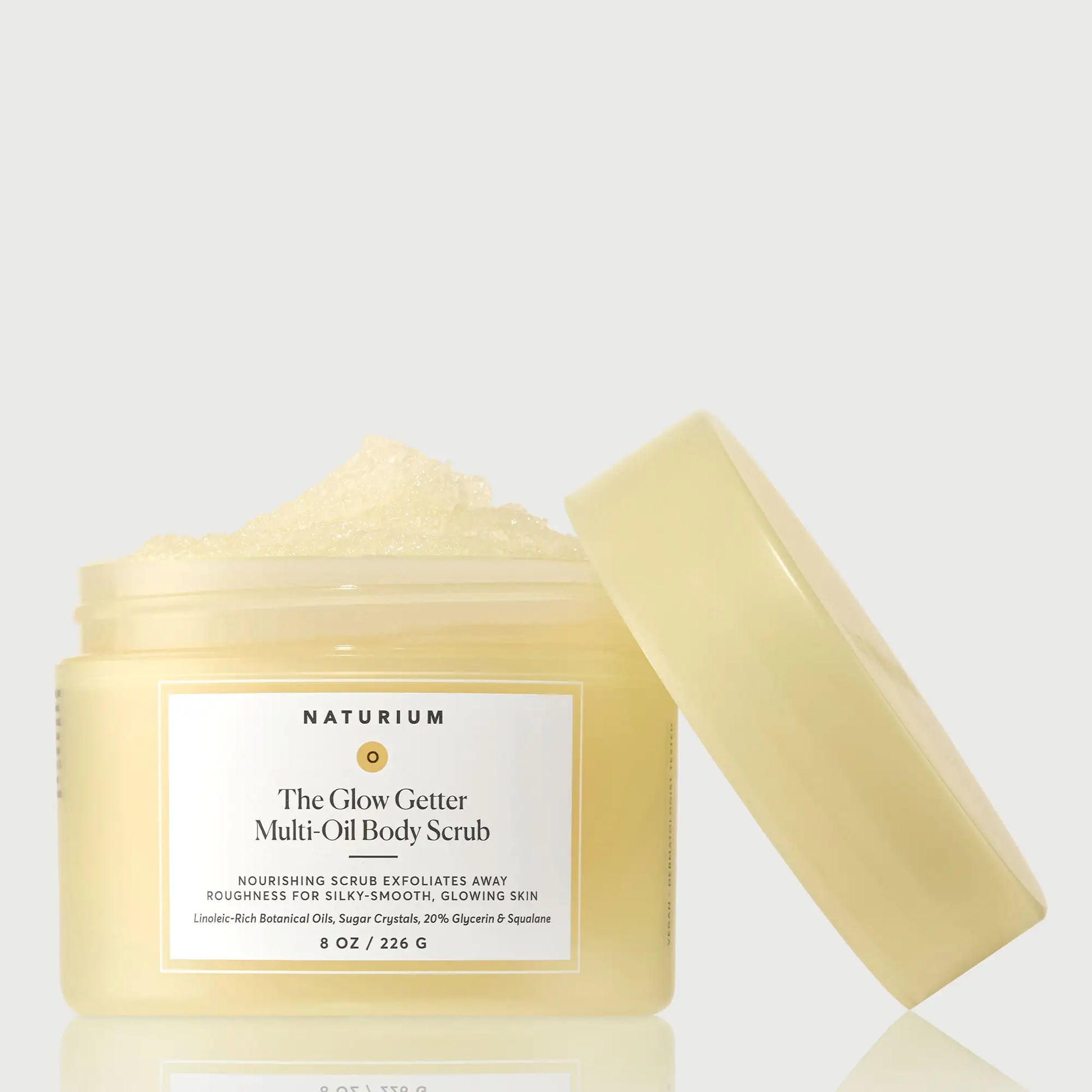 the-glow-getter-multi-oil-body-scrub-m8 NATR-40028-GlowGetter-Multi-Oil-Body-Scrub-Front-CapOff-bonebkgd.webp