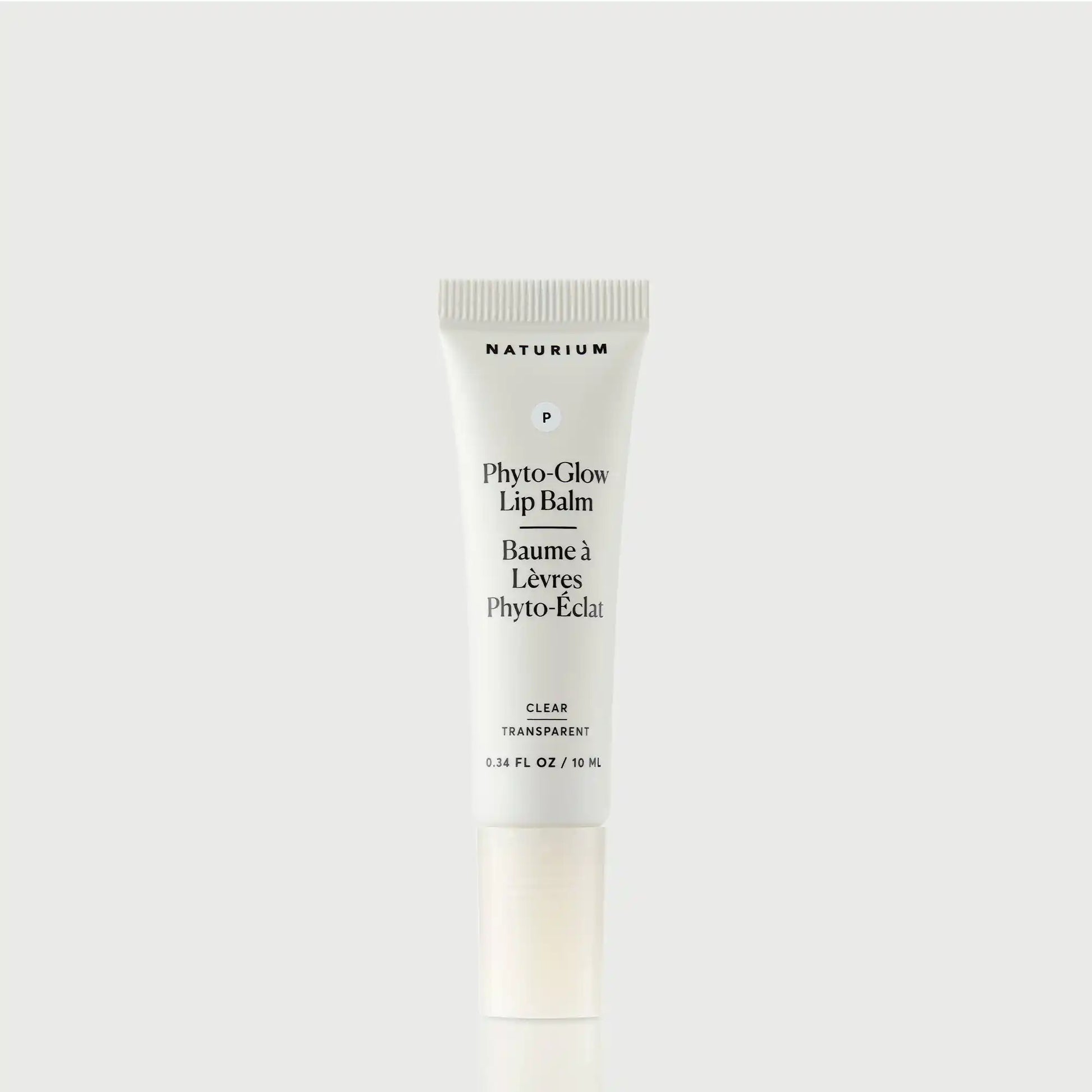 phyto-glow-lip-balm-clear-b4 NATR-60066_PhytoGlow_Clear_primary_capon_front-bonebkgd.webp